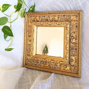 Vintage ornate gold mirror